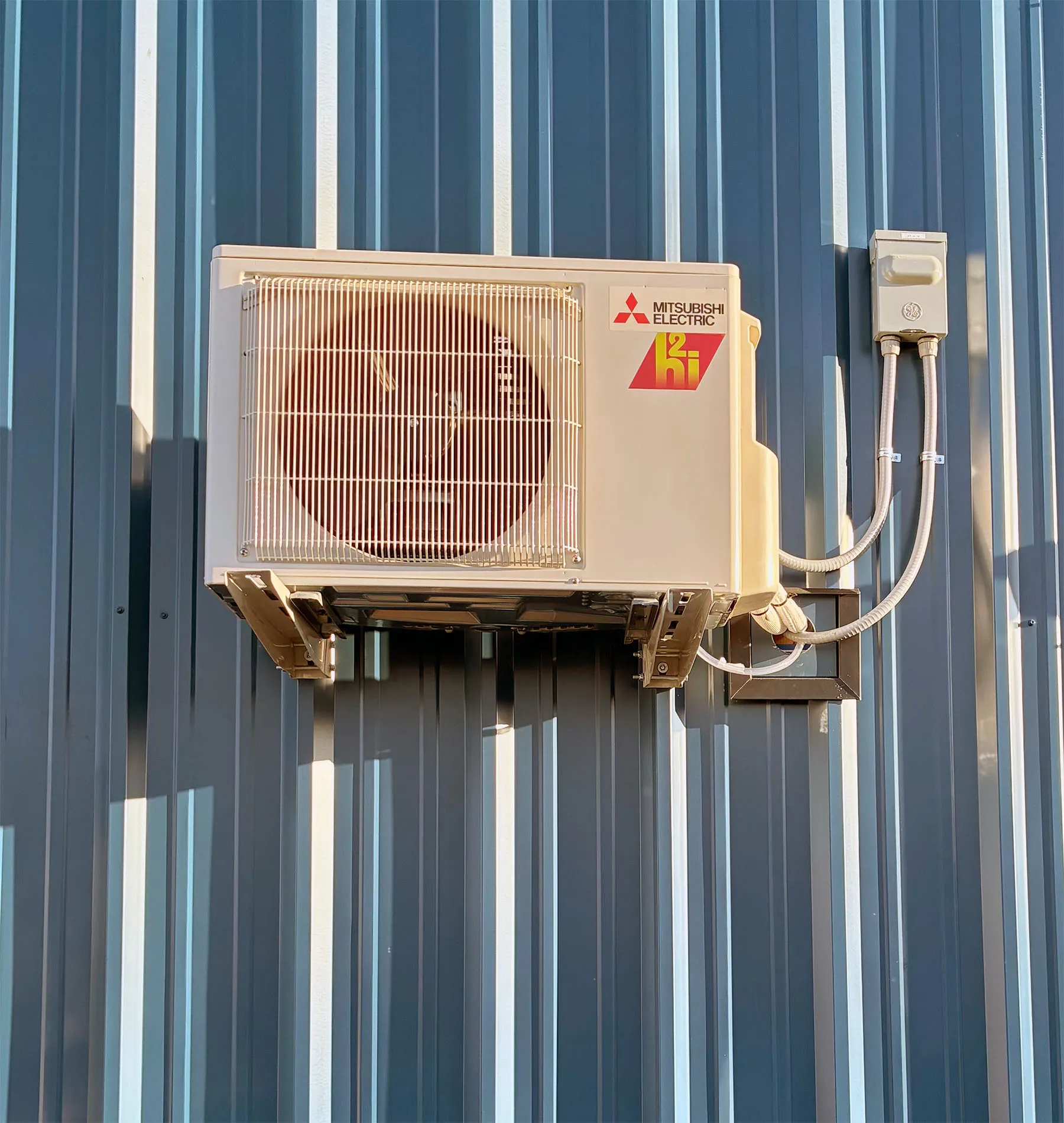 Elevated Mitsubishi commercial heat pump installation