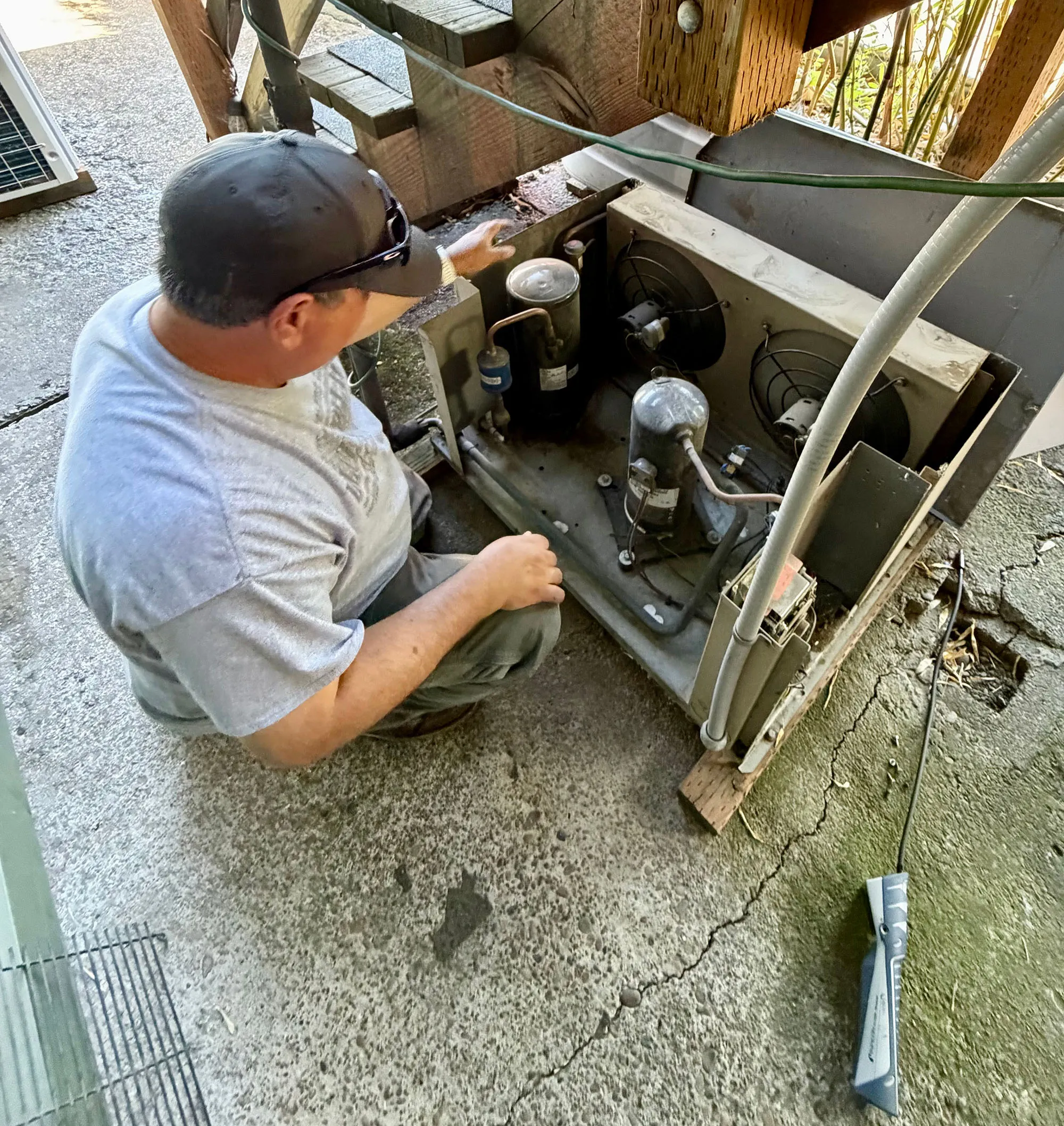 Mike servicing an outdoor commercial condensing unit